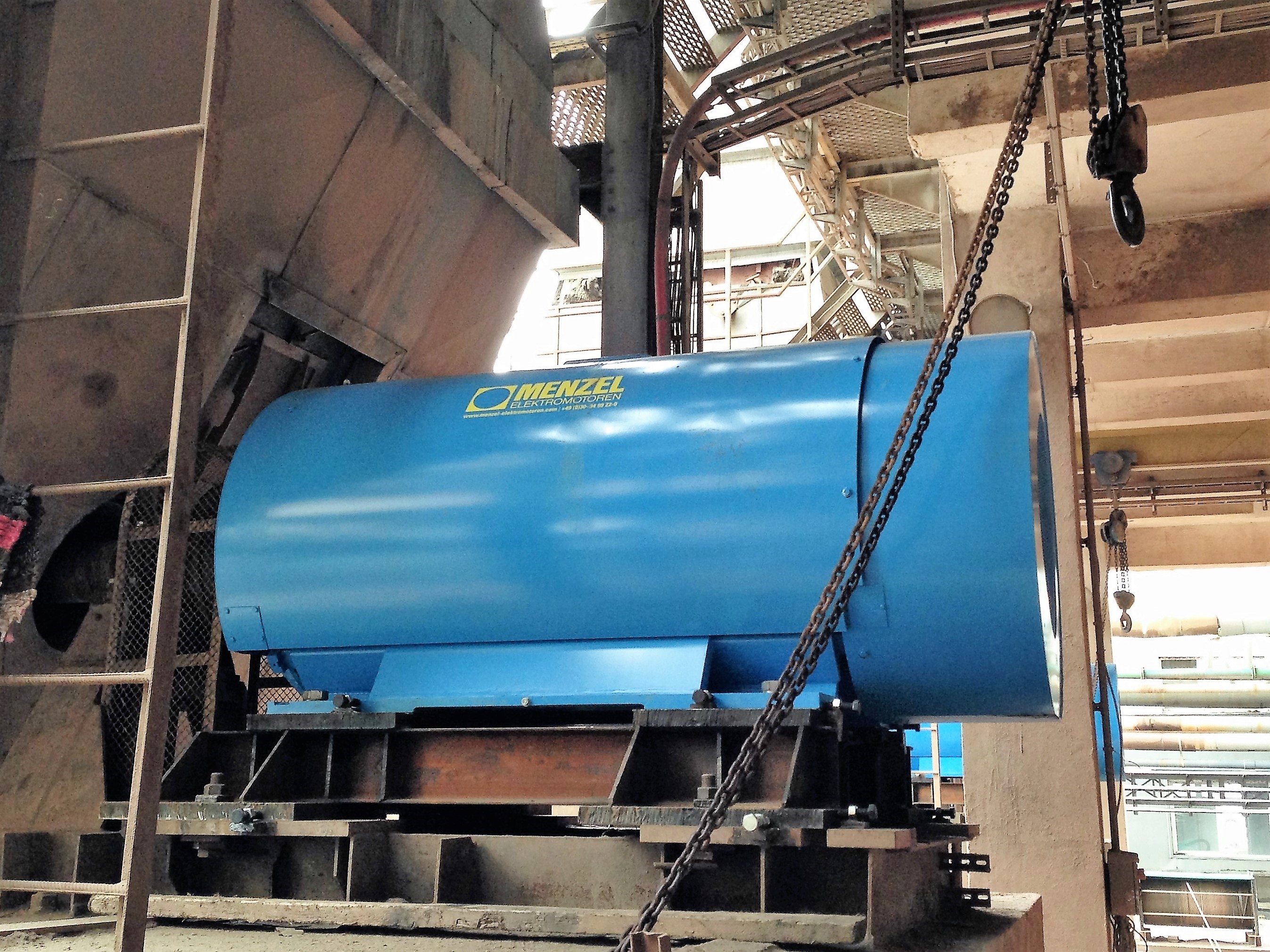 6000 V three-phase squirrel cage motor to drive conveyor belt 6000 V three-phase squirrel cage motor in powerplant that drives conveyor belt